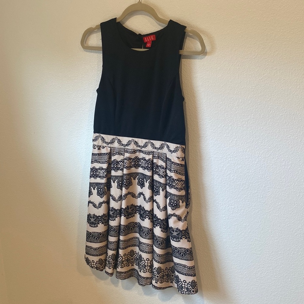 Elle black and cream dress
